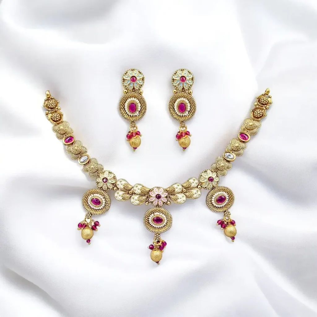 Ganga Dashara Kyon Manaya Jata Hai & Why South Indian Jewellery Sets Are Perfect for This Occasion 3 Sitara Ruby Red – Antique Choker Set with Earrings