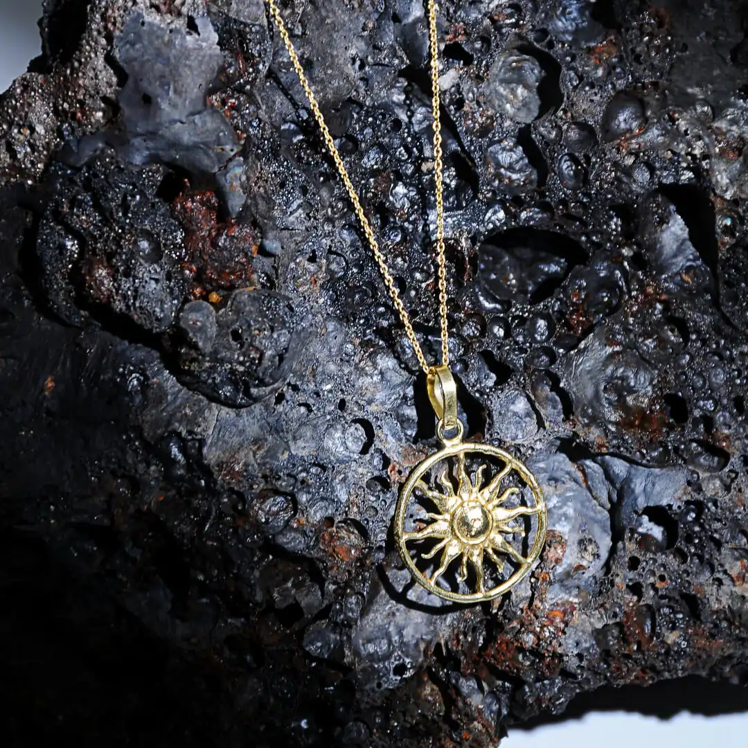 Solara – Gold-Plated Radiant Sun Emblem Pendant Necklace