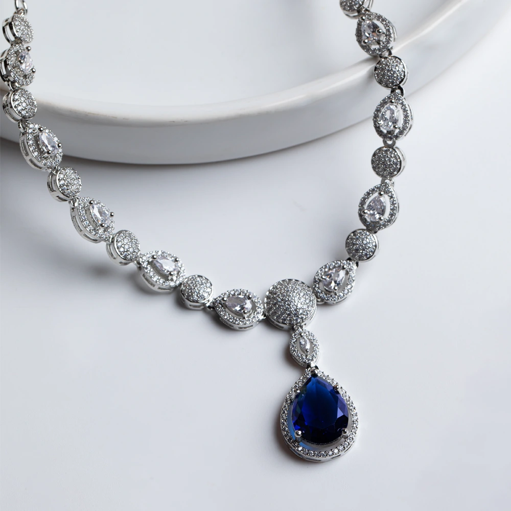 Celestara – Sapphire Teardrop Elegance Necklace Set