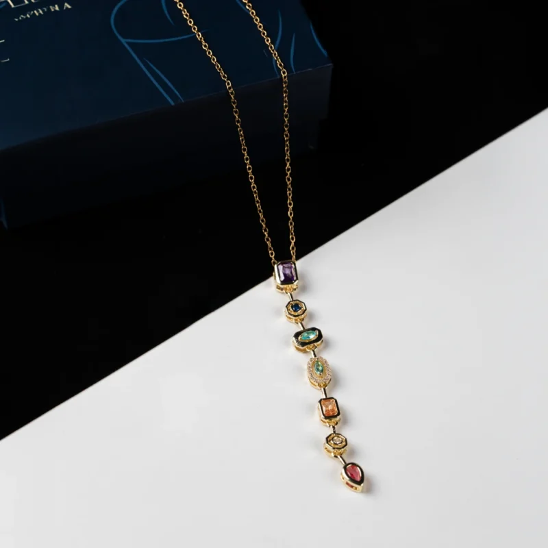 Verdant Harmony layered pendant necklace with green accents and multistone pendant