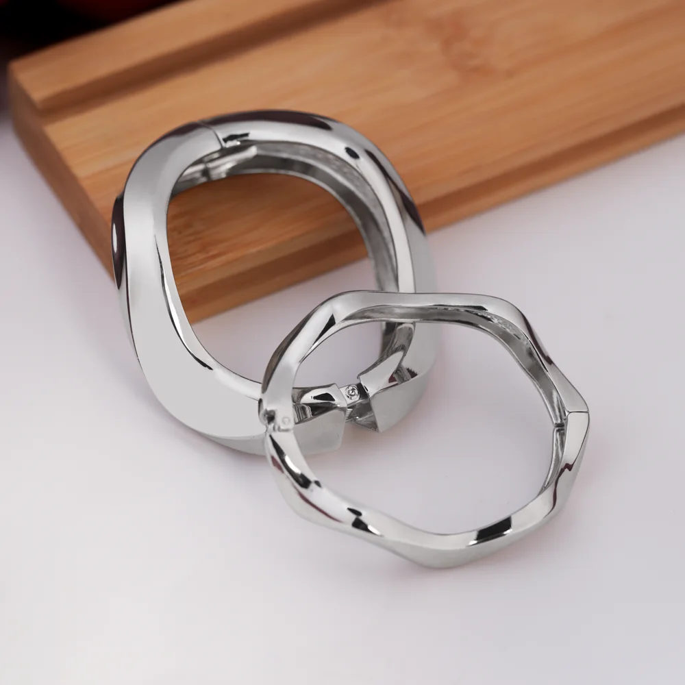 Aether – Sculptural Silver Bangle Duo