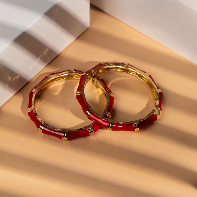 Carmine crimson enamel bangle set for women with gold accents