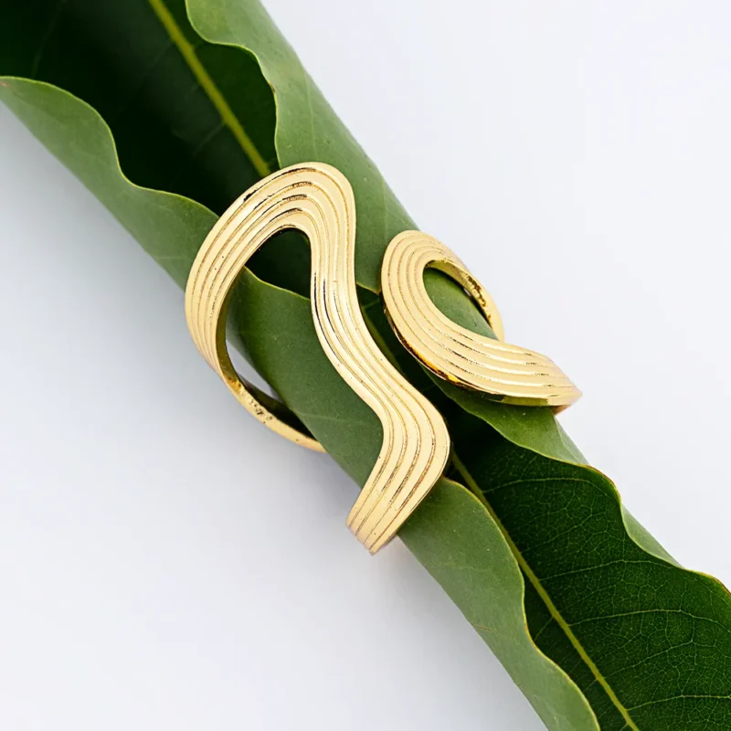 Shop the Solenne Sculpted Wave Ring, one of the trendy rings for women with a modern gold finish. Buy rings online for effortless everyday style.